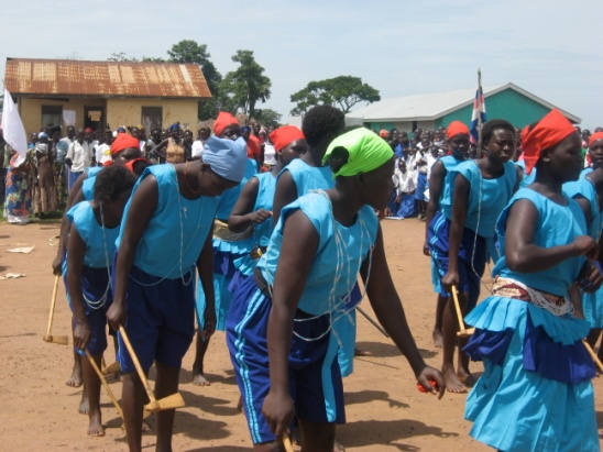 Young women perform traditional dances during an event in Gulu district, 2010