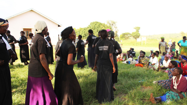Families of the Missing perform a song during a dialogue in Lamogi sub-county, Amuru on 26 August 2015.