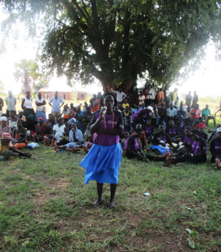  The chairlady of Amapara women’s group addressing the community in Aringapi subcounty on 8th October 2015 on the challenges that survivors of SGBV are facing in the community.