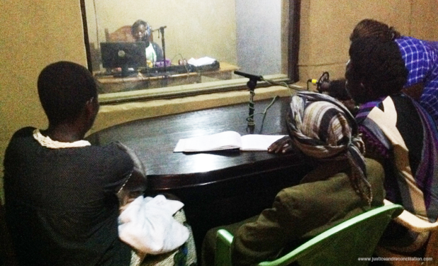 Women participate in a radio talkshow in Kumi to talk about the reintegration of children born of war.